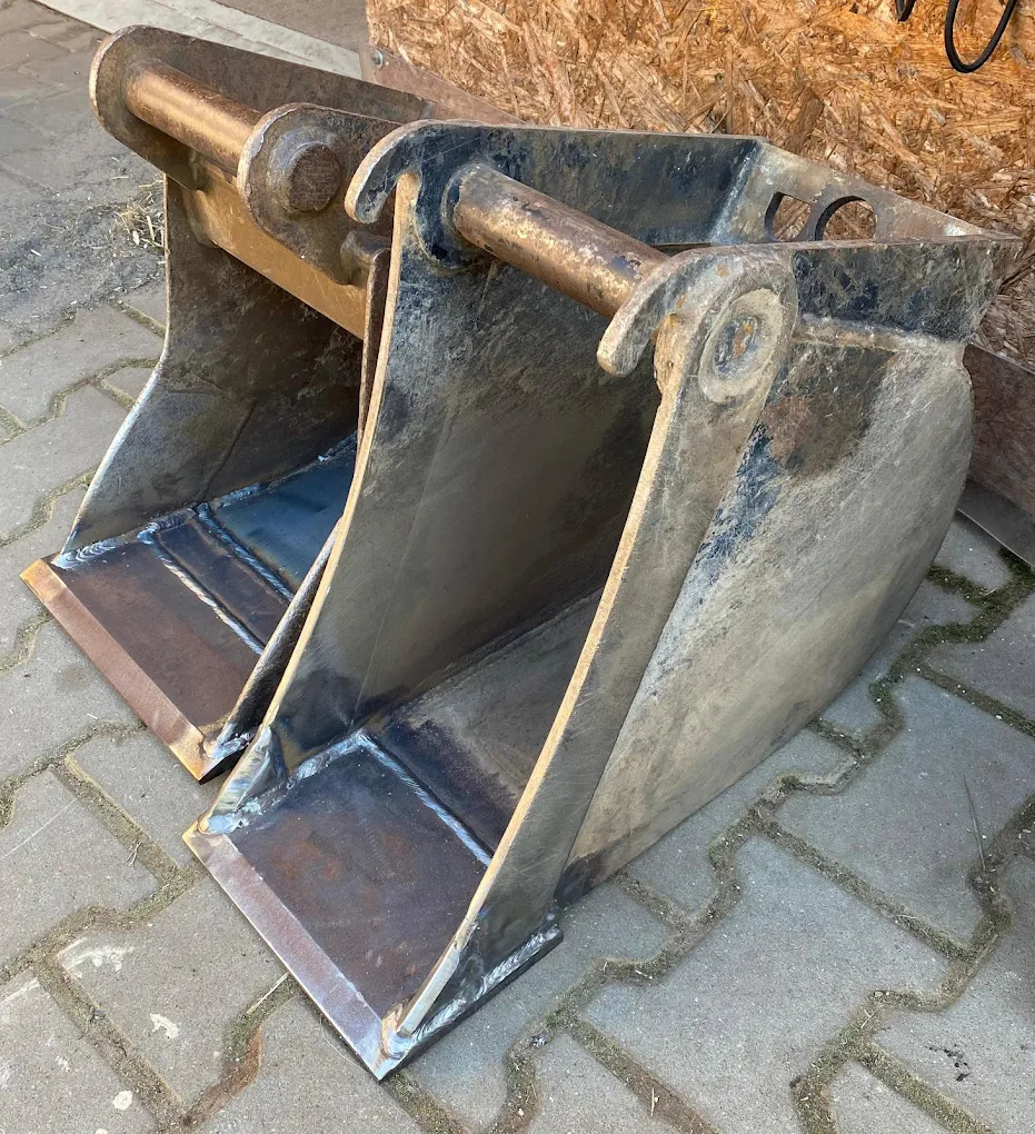 Reparatur Schweißarbeit an Baumaschine