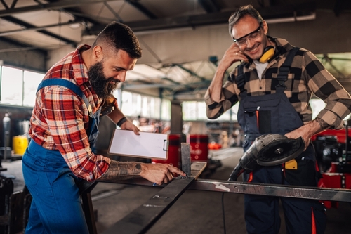 Project,Manager,Marking,All,The,Spots,On,The,Metal,Plate